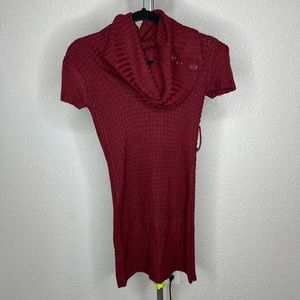 A burgundy long fitted sweater